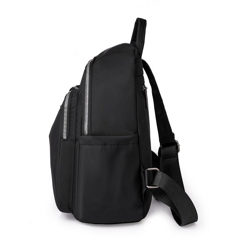 Spot al por mayor 2023 nueva mochila de nailon para mujer coreana simple y ligera mochila de viaje al aire libre mochila escolar de moda