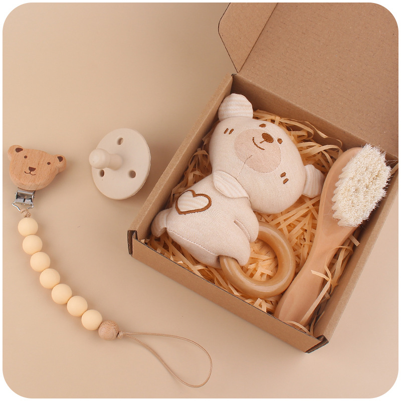 Nuevo bebé de dibujos animados León sonajero mordedor calmante bebé DIY creativo cepillo pezón Cadena de cuatro piezas conjunto