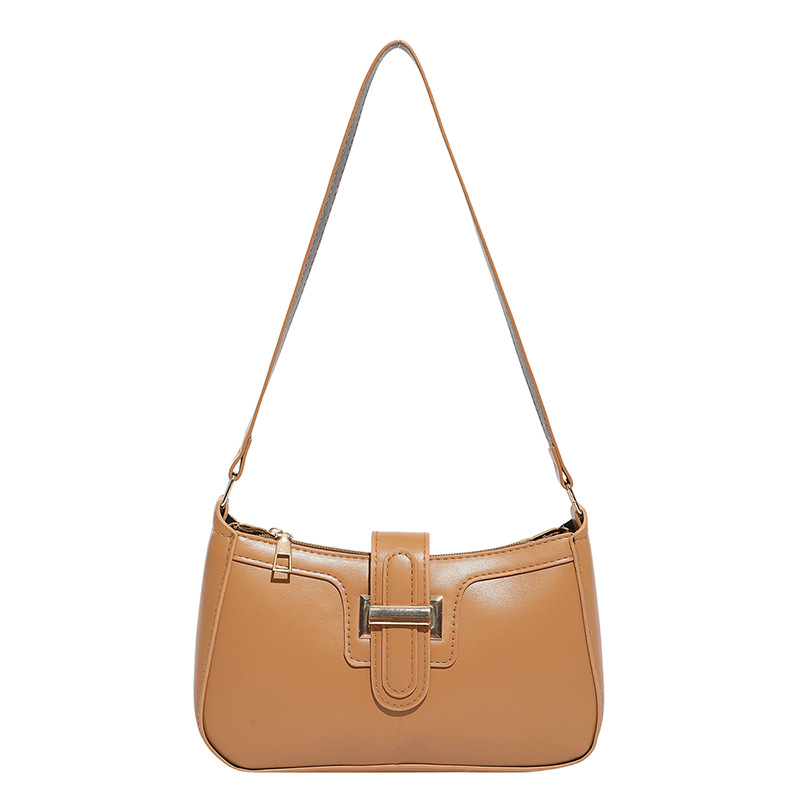 2025 nueva moda versátil bolso de brazo de mujer sensación de alto nivel bolso de hombro simple nicho de diseño de mano de viaje
