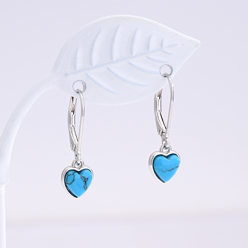 Explosiones transfronterizas 925 plata esterlina pendientes turquesa mujeres europeas y americanas pendientes de amor retro bohemia pendientes