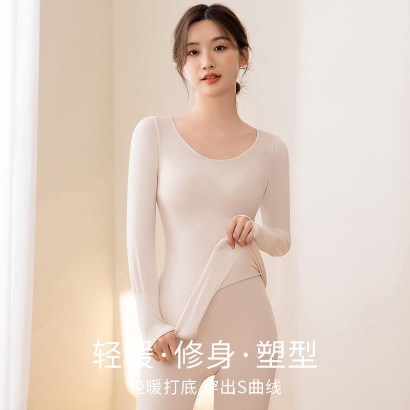 Ropa de otoño traje de calefacción interior de las mujeres Otoño e Invierno ropa de cuidado de la piel de fondo Delgado cuello redondo acrílico superior caliente de las mujeres