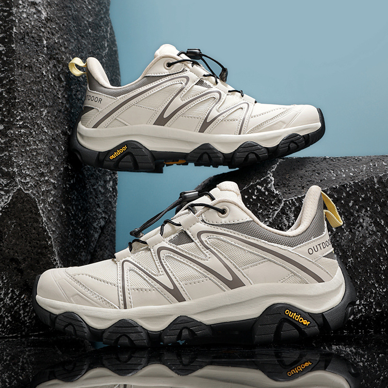 Explosiones transfronterizas al aire libre para hombres y mujeres transpirables nuevos zapatos de montaña al aire libre anti-deslizante para parejas