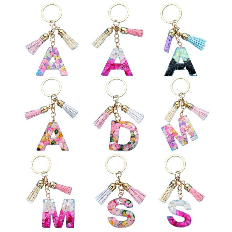 Creative acrylic keychain with letters with tassels