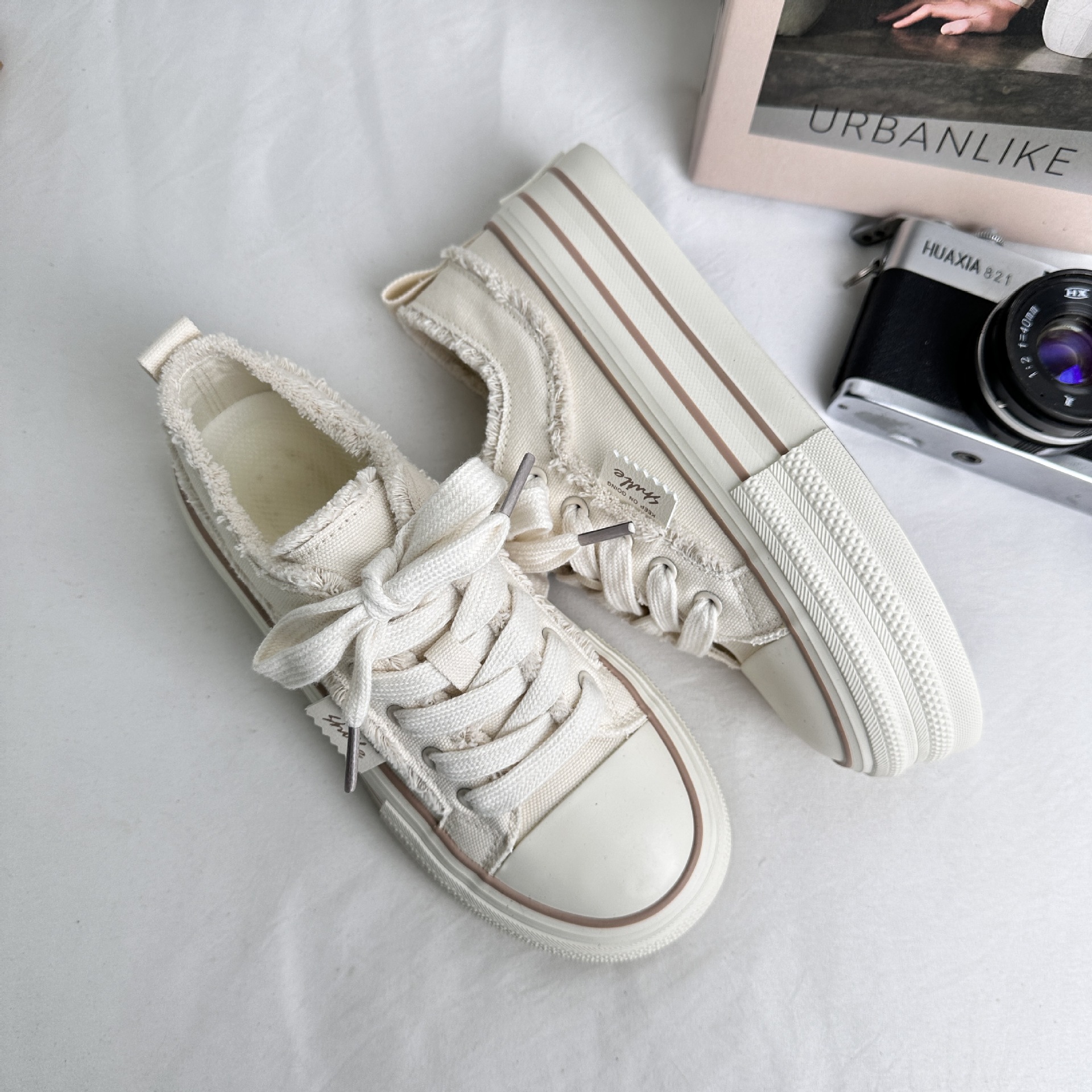 Yuanbo 2025 primavera y verano nuevos zapatos de lona de suela gruesa para estudiantes, zapatos casuales de todo fósforo, borlas, zapatos de mujer de tendencia