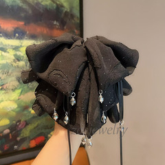 黒のドリルの蝶結びは女性のフランス式の高級感があります。