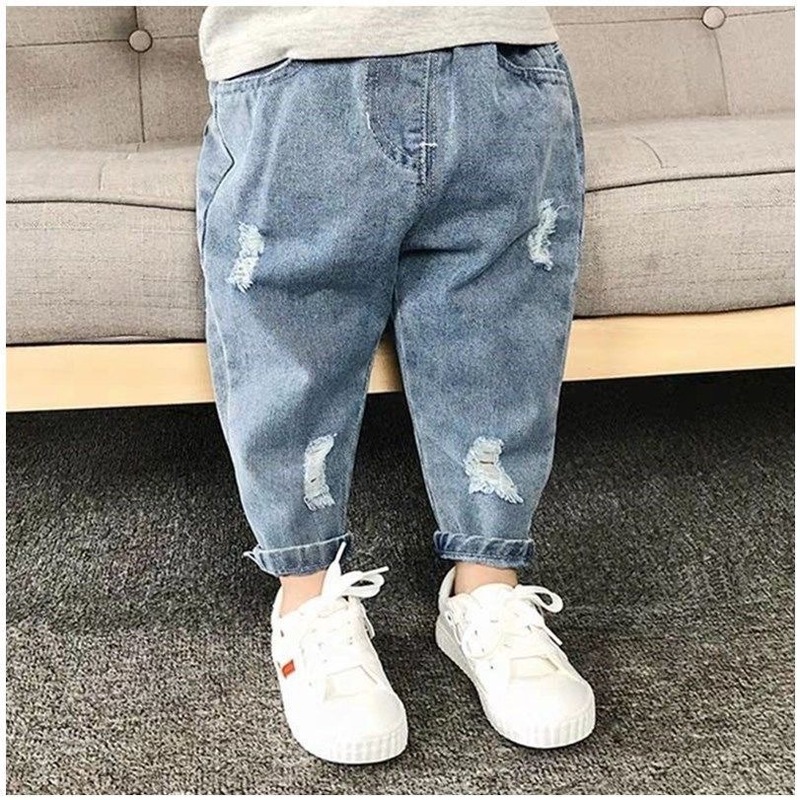 子供服の子供の穴が開いているジーパンの春と秋の新型の1-8歳の女性の男の子のゆったりしているズボンの赤ちゃんの洋気のお父さんのズボン|undefined