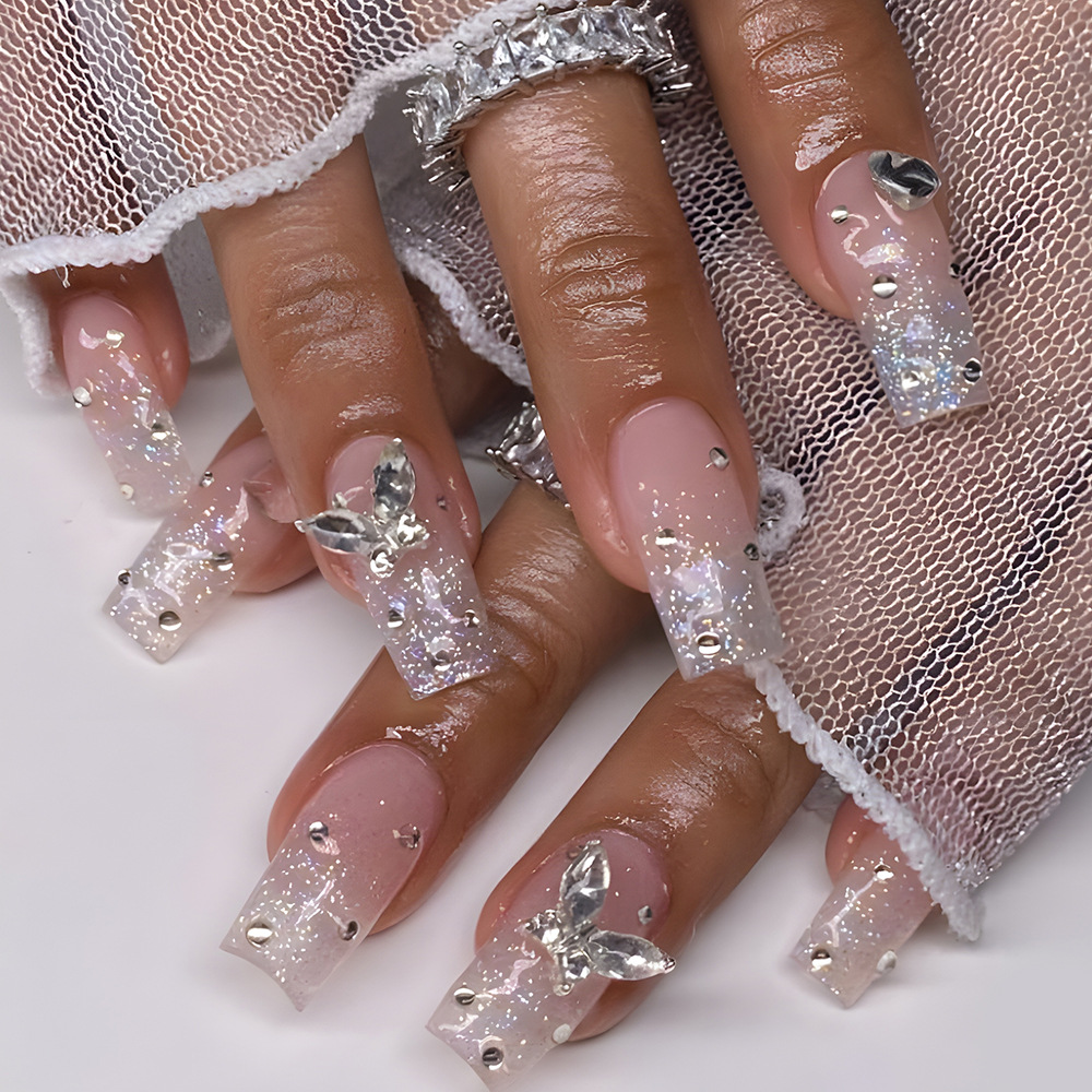 Europa y los Estados Unidos explotaron amor diamante de manicuras, flash dulce y cool usar uñas simples mariposa manicuras falsas productos al por mayor