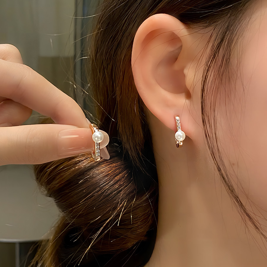 Estilo coreano S925 Plata pequeños pendientes de perlas simples de las mujeres pendientes de temperamento de moda retro pendientes ins pendientes artísticos