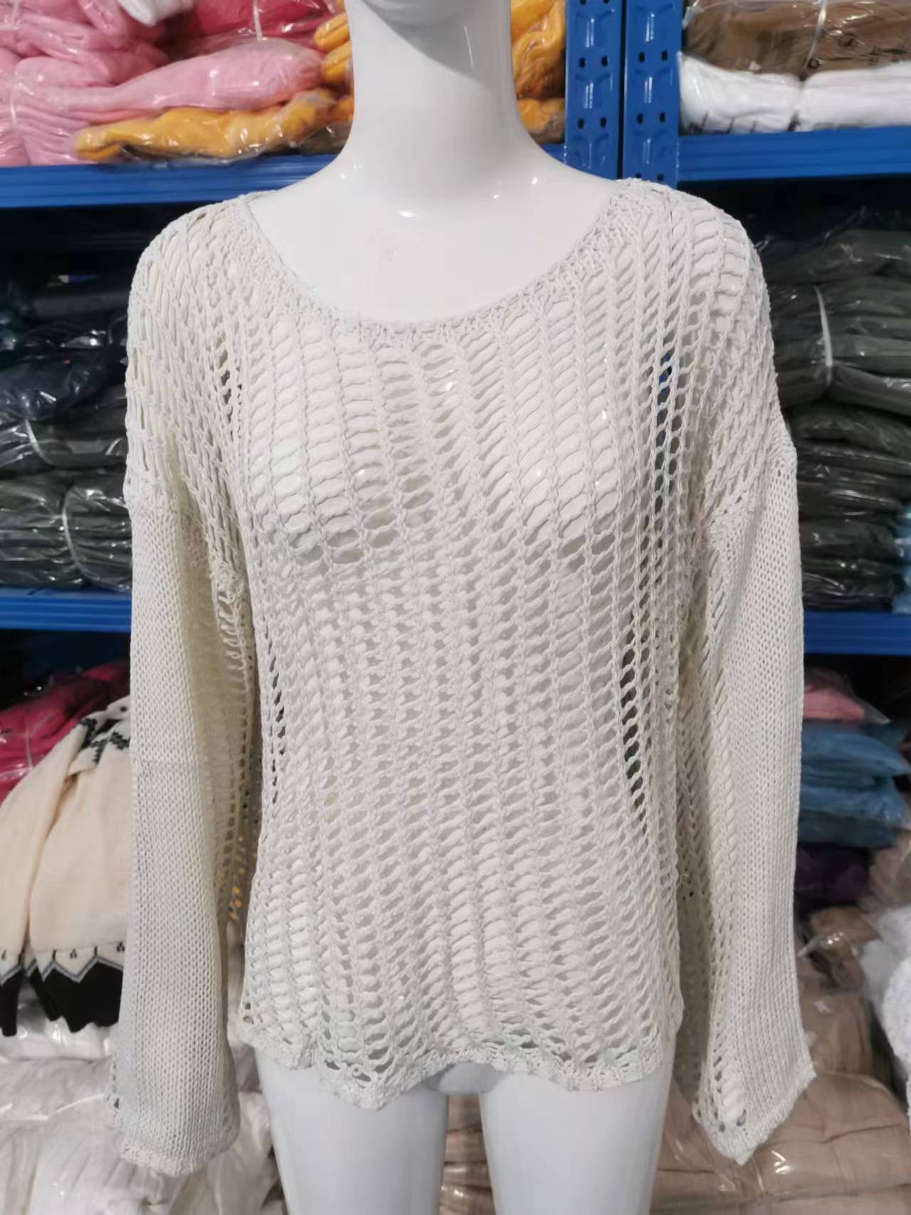 2024 verano transfronterizo comercio exterior de Amazon blusa de gancho de mano playa suéter de punto de vacaciones hueco camisa de protección solar de manga larga para mujer