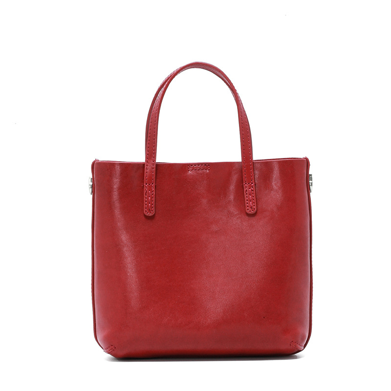 Borsa a secchiello, borsa a mano, in vera pelle bovina conciata al vegetale di alta gamma, versatile e di nicchia._voghion.com
