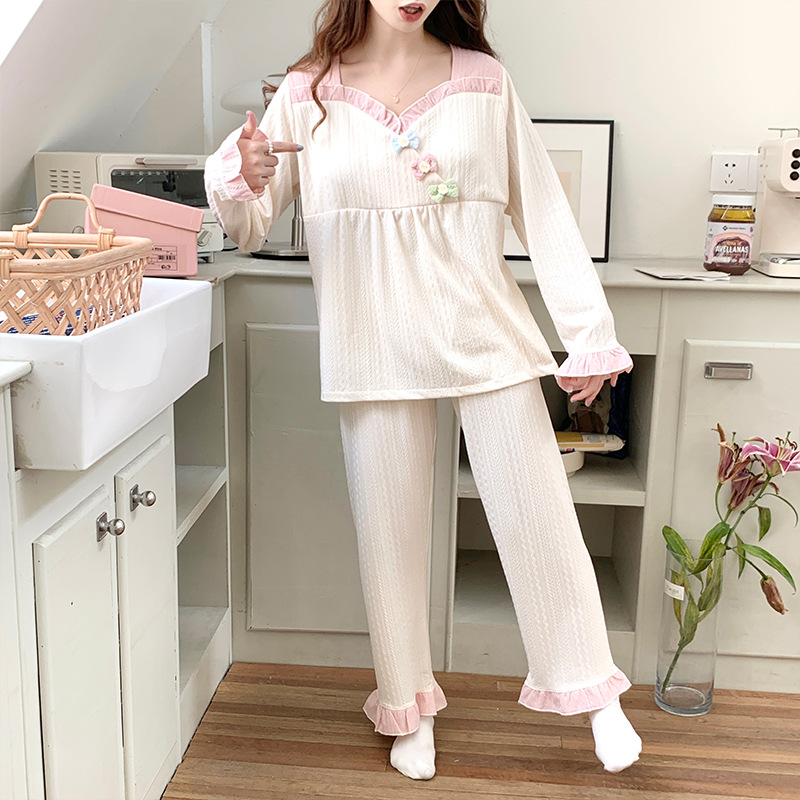 2023 nuevos pijamas de las mujeres de algodón jacquard con cuello en V Jersey de algodón de manga larga Otoño e Invierno dulce desgaste del hogar con el pecho pad traje