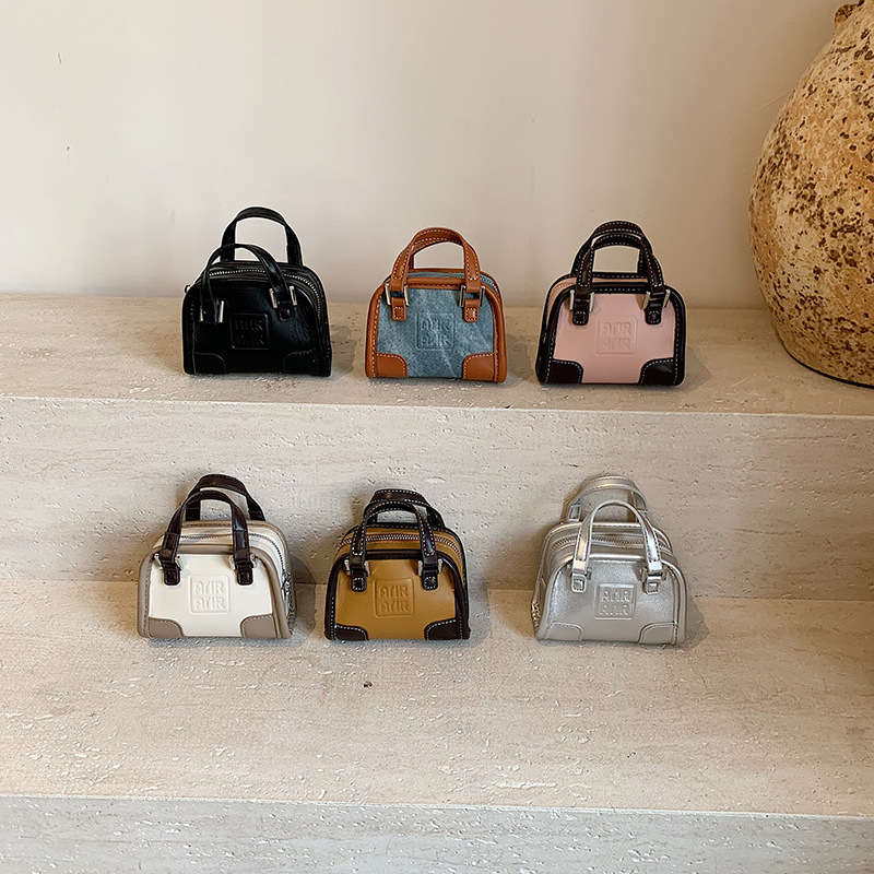 Bolso de hombro de niña de color de contraste de moda coreana, letra de estilo occidental, mini bolso de bebé, nuevo bolso de comercio exterior para niños