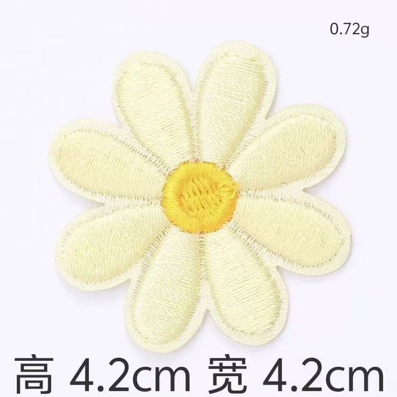 国境を越えたアマゾンの精巧な立体マカロンの小さい花のコンピュータの刺繍の布はDIYの手作業の材料の現物を貼って卸売りします。|undefined