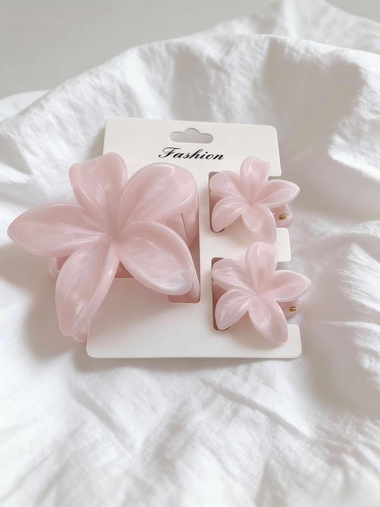 Ventas transfronterizas calientes nuevos huevos láser de dos colores clip de agarramiento de flores de cabeza posterior clip de tiburón clip de cabello joyerías para el cabello