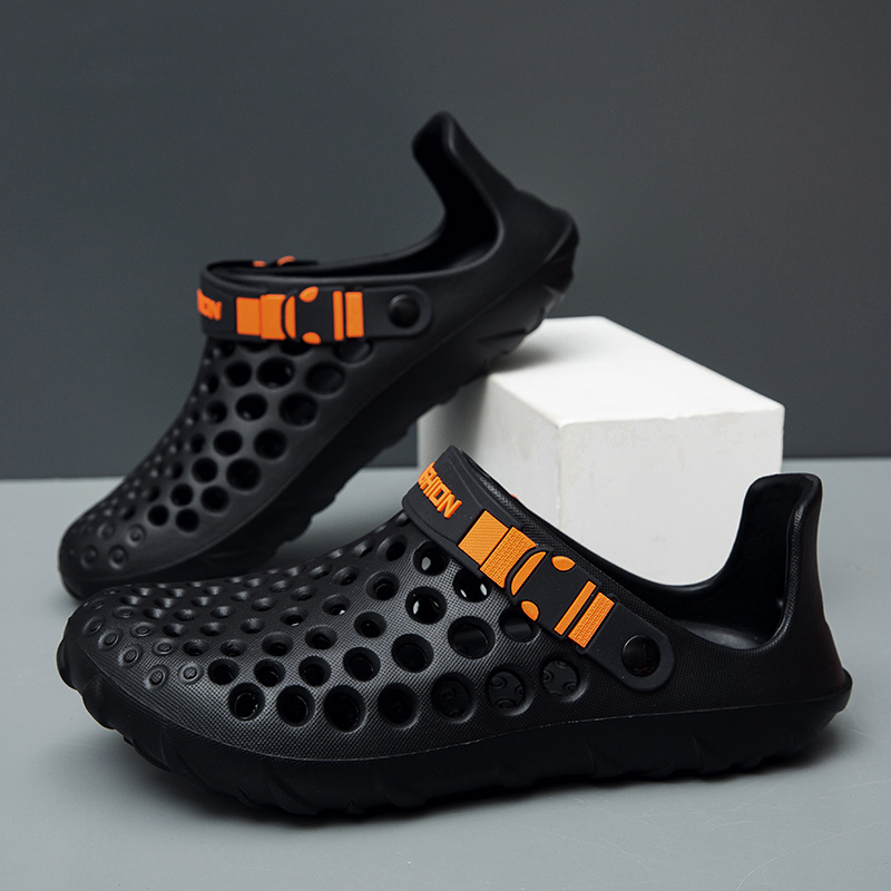 2025 verano transfronterizo nuevos zapatos con agujeros sandalias de playa para hombres Baotou hueca suela suave sandalias y zapatillas de exterior de gran tamaño