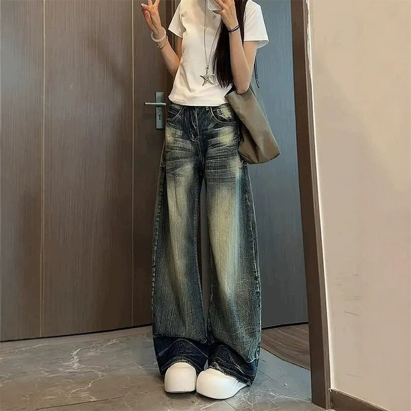 American-style super stylish distressed loose jeans for women, summer 2026 new model, slimming curved cut, ultra-trendy floor-length wide-leg pants