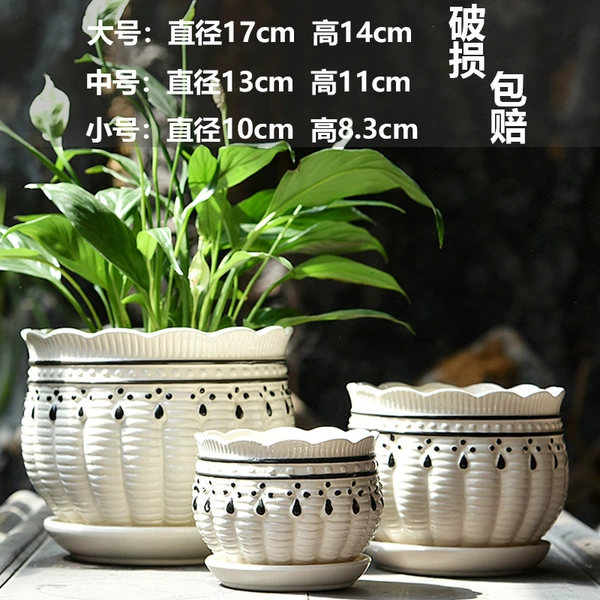 3 black and white flower pots