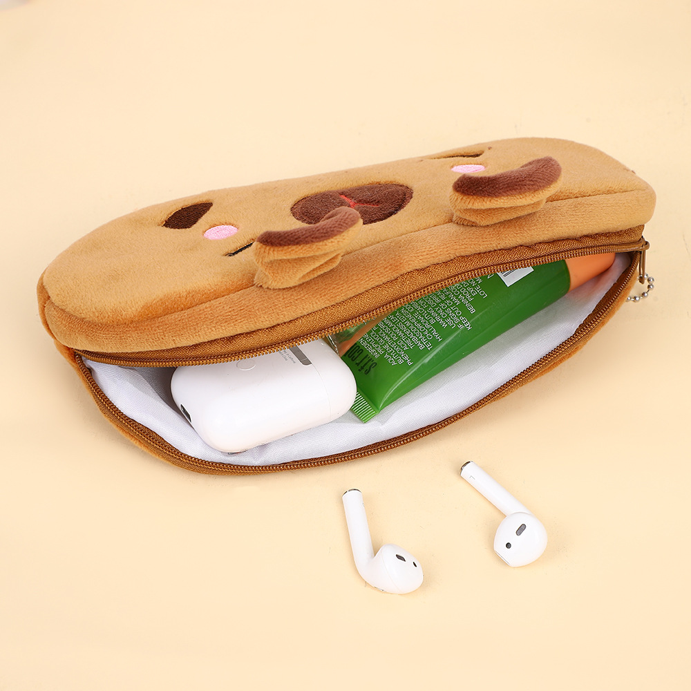 Bolso de lápices de felpa Kapibala de estilo explosivo Bolso de papelería para niños de carpincho de dibujos animados de gran capacidad Bolso de almacenamiento de suministros escolares