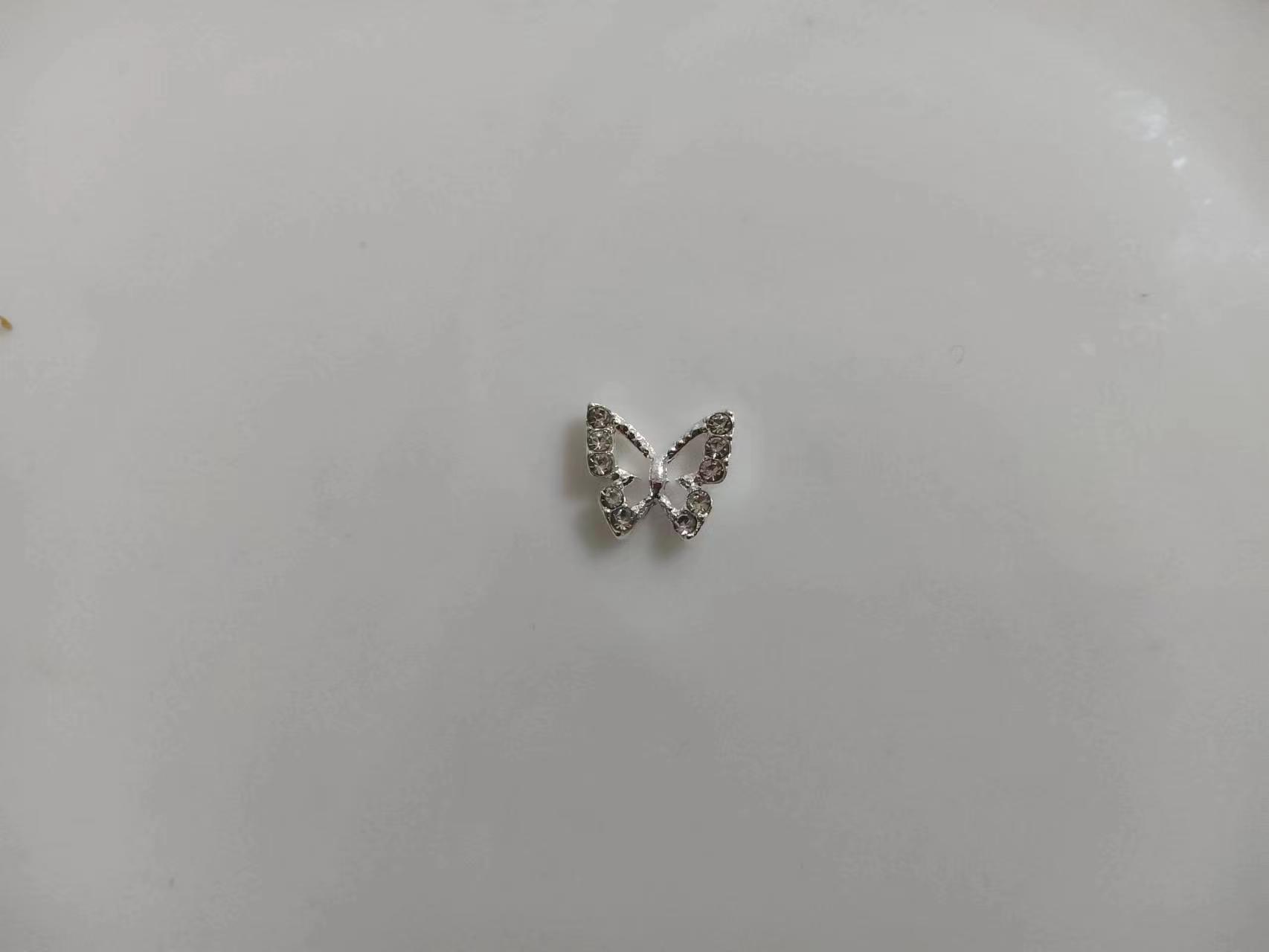 Joyería de mariposa de uñas aleación hueca pequeña mariposa joyería de uñas diamante oro y plata pieza de uñas decoración pequeña mariposa fresca