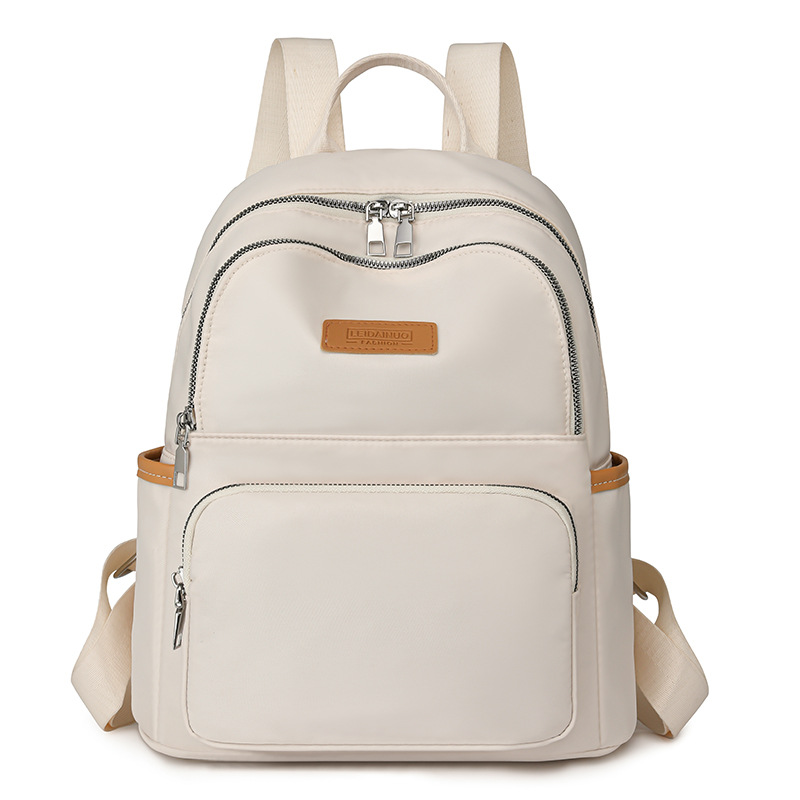 2024 nueva mochila de nylon para mujer, bolso de tela de todo fósforo de estilo coreano de moda, mochila pequeña para madre de viaje de ocio ligero