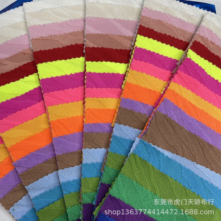 新款针织条纹提花布 斑马云提花 250克弹力提花布 泳装服装等面料