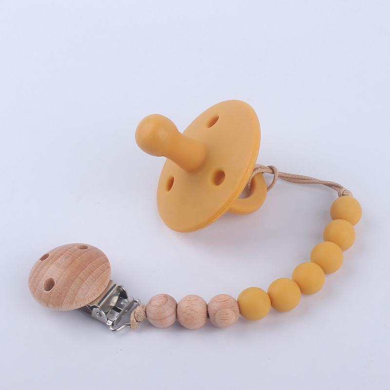 Nuevos suministros para bebés chupete bebé pezón de silicona creativo bebé mordida Cadena de pezón de silicona conjunto de dos piezas