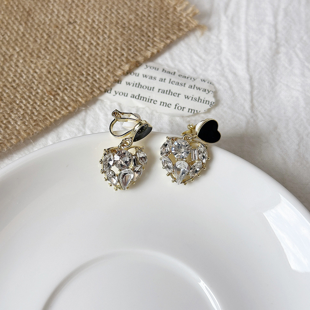 Versión coreana del temperamento de camelia, sin orejas perforadas, pinza para la oreja, flor de perla, tablero de ajedrez, pinza para la oreja triangular con diamantes, pendientes de nicho para mujeres