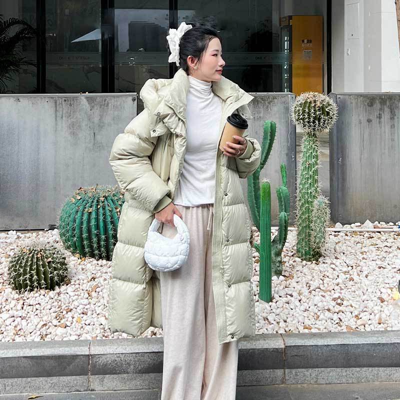 Alta sensación super ligera nubes puff plumón chaqueta para mujeres 2024 invierno nuevo 90 chaqueta de acero blanco grueso