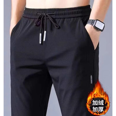 ベルベットのズボンの男秋冬の弾力性ストレート男性カジュアルパンツのトレンドは、暖かい男性パンツのストラップのスポーツパンツを身に着けています