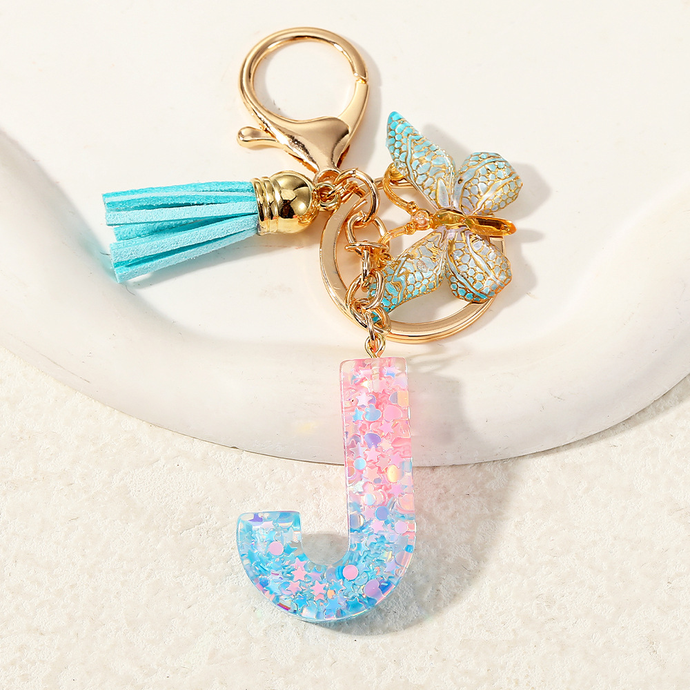 Europa y los Estados Unidos transfronterizos nuevos cristal sequinado goteo de goma letras inglesas joyería llavero y bolsos colgante apoyo al por mayor