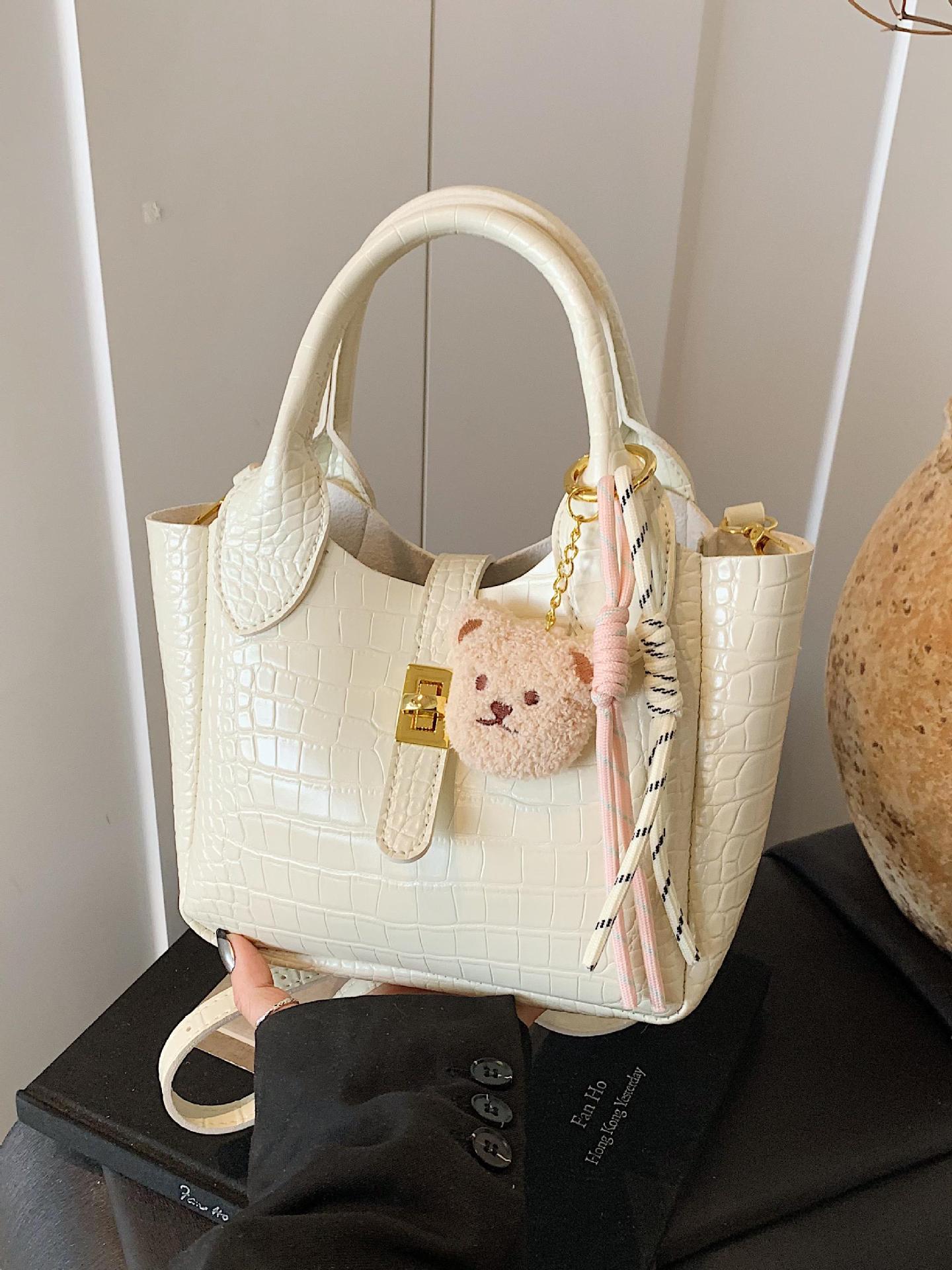 Comercio exterior super fuego patrón de cocodrilo llevar a mano bolso de cubo mujer 2025 nuevo bolso de hombro de viaje de moda bolso de mensajero de todo fósforo