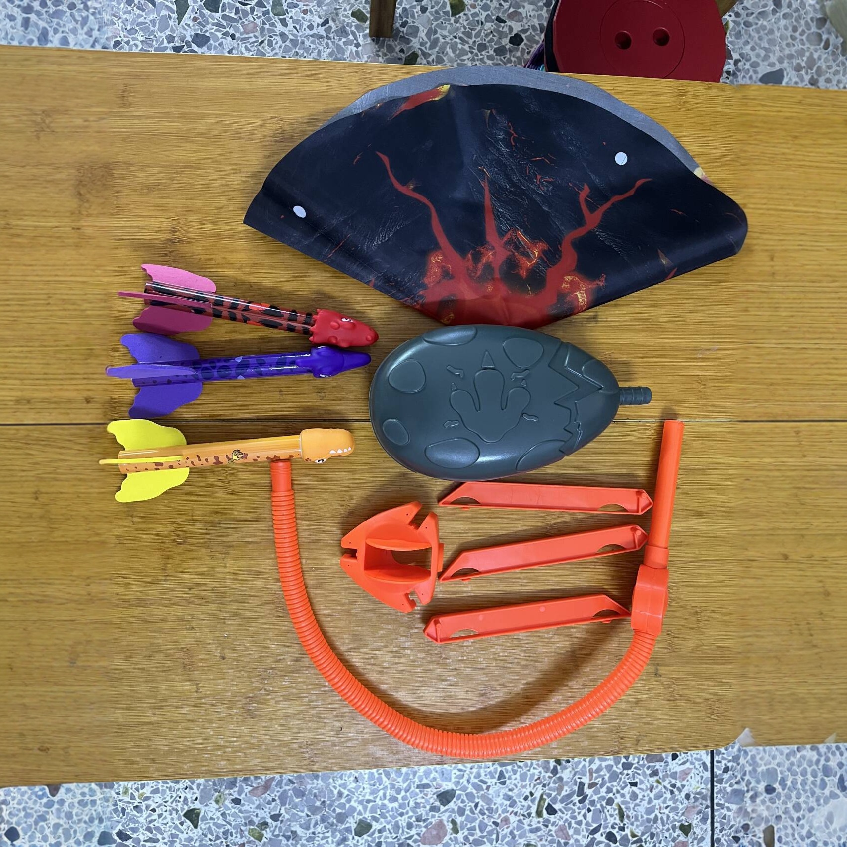 Juguetes interactivos al aire libre transfronterizos volar dinosaurios cohetes Amazon lanza cohetes artillería catapulta platillos voladores