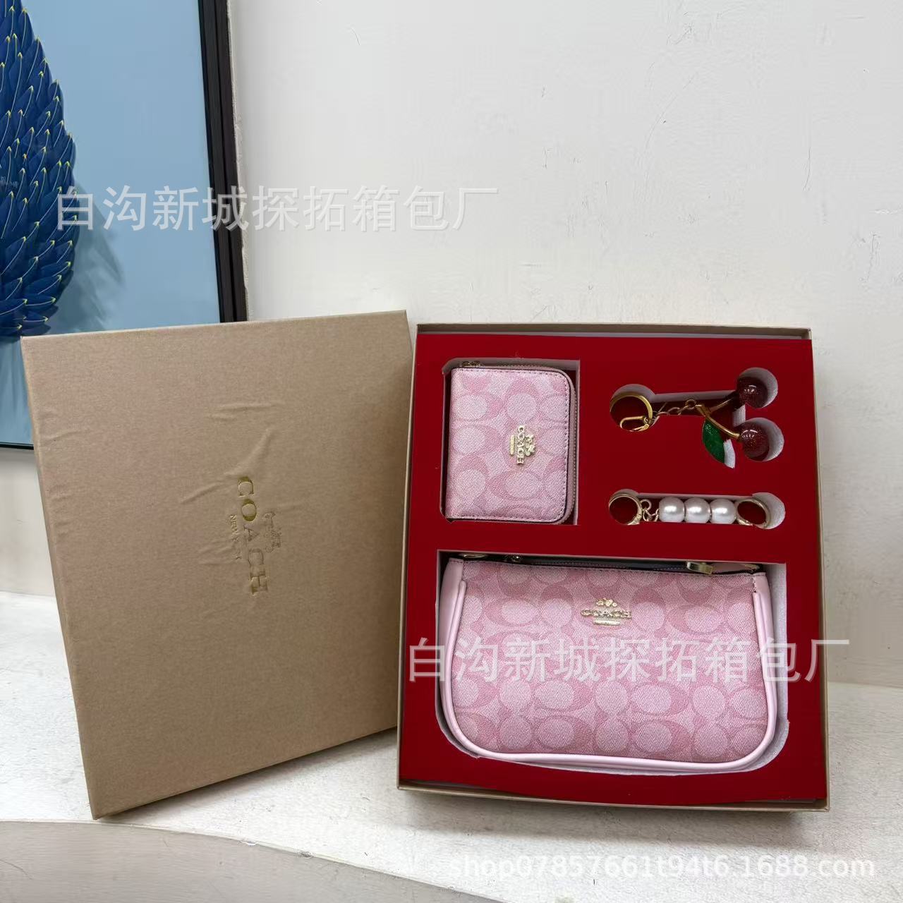 Transfronterizo paquete de bolsas de mano de damas 2025 nueva moda impresa bolsa de cambio llaveros caja de regalo universal
