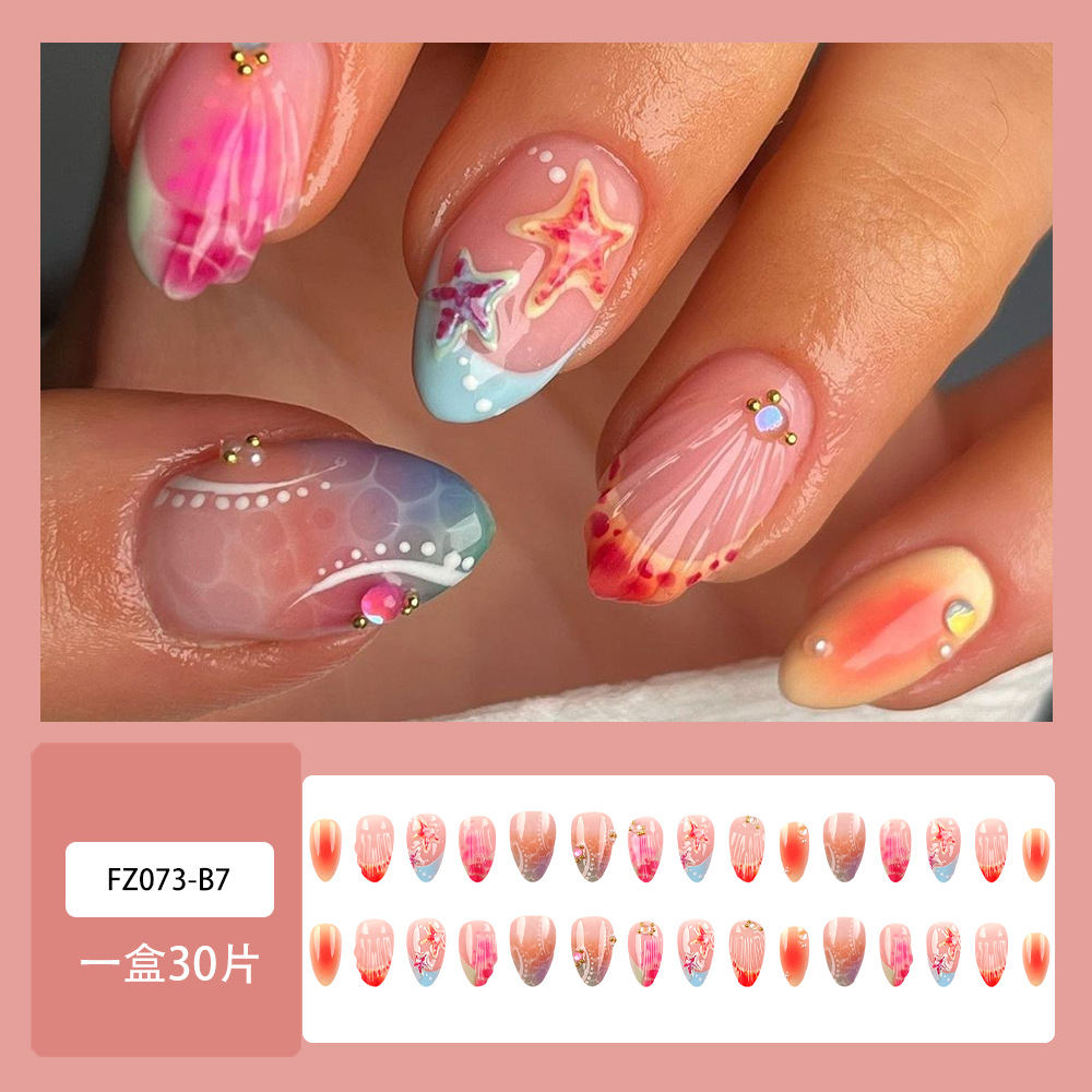 Use un parche de uñas 3D estereoscópico de alto nivel, goteo de goma dulce y caliente, uñas falsas transfronterizas, parches de uñas.