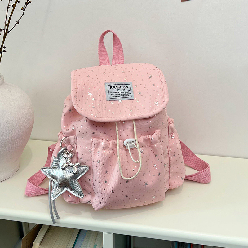 Primavera nuevo estilo ins leche de viento bonito joven estrella impresa mochila de hombro para mujeres de alto valor dulce mochila pequeña