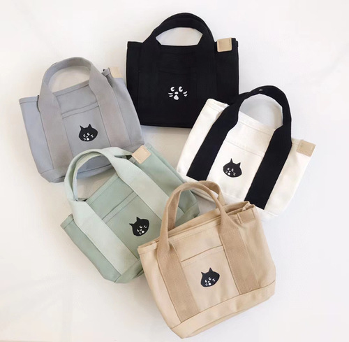 Japanese surprised cat cartoon cute canvas handbag casual versatile hand storage bag student lunch bag