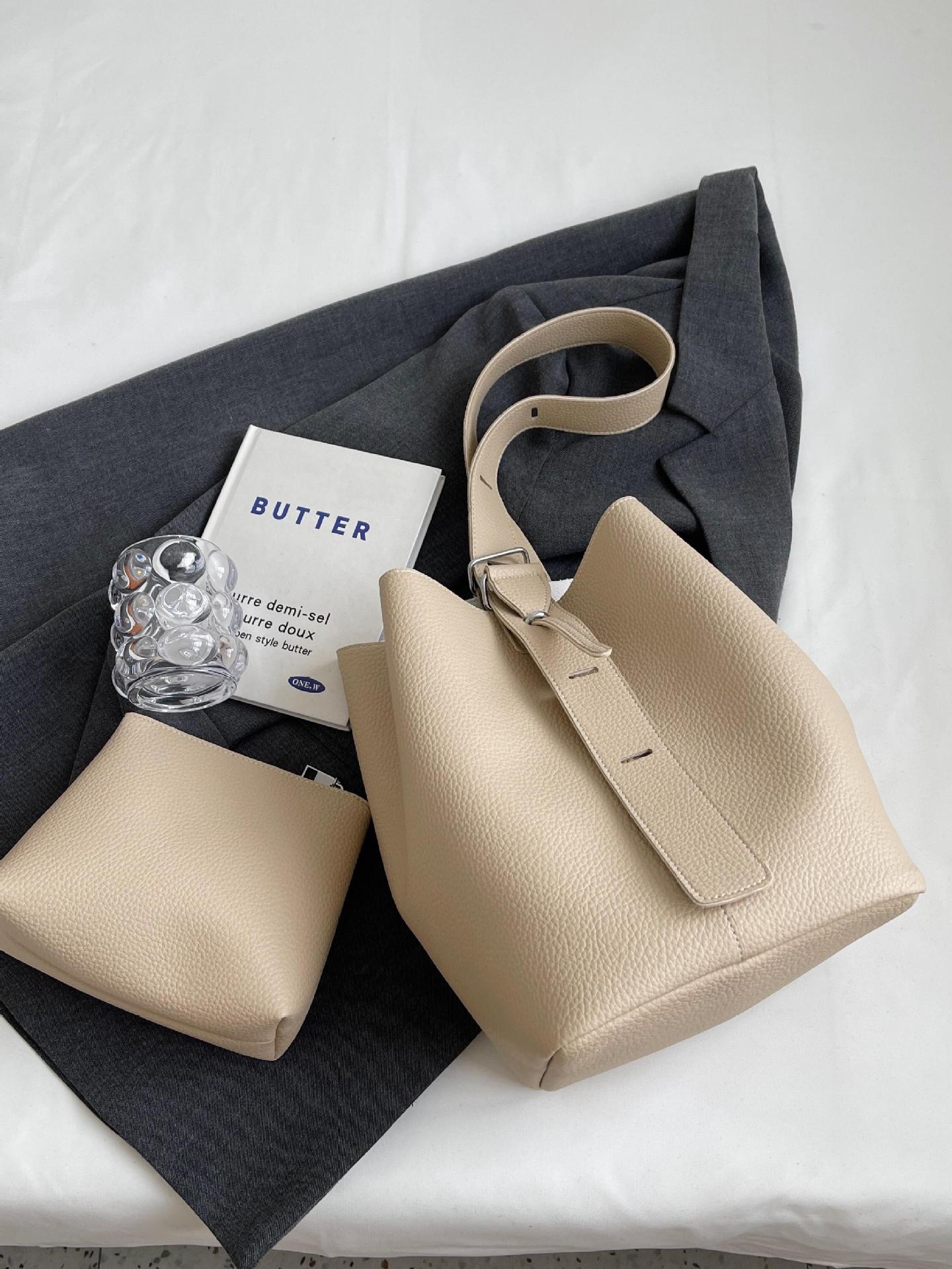 Bolso de cubo simple retro súper fuego transfronterizo para mujer 2025 nuevo bolso de hombro casual de todo fósforo Bolso Tote de gran capacidad