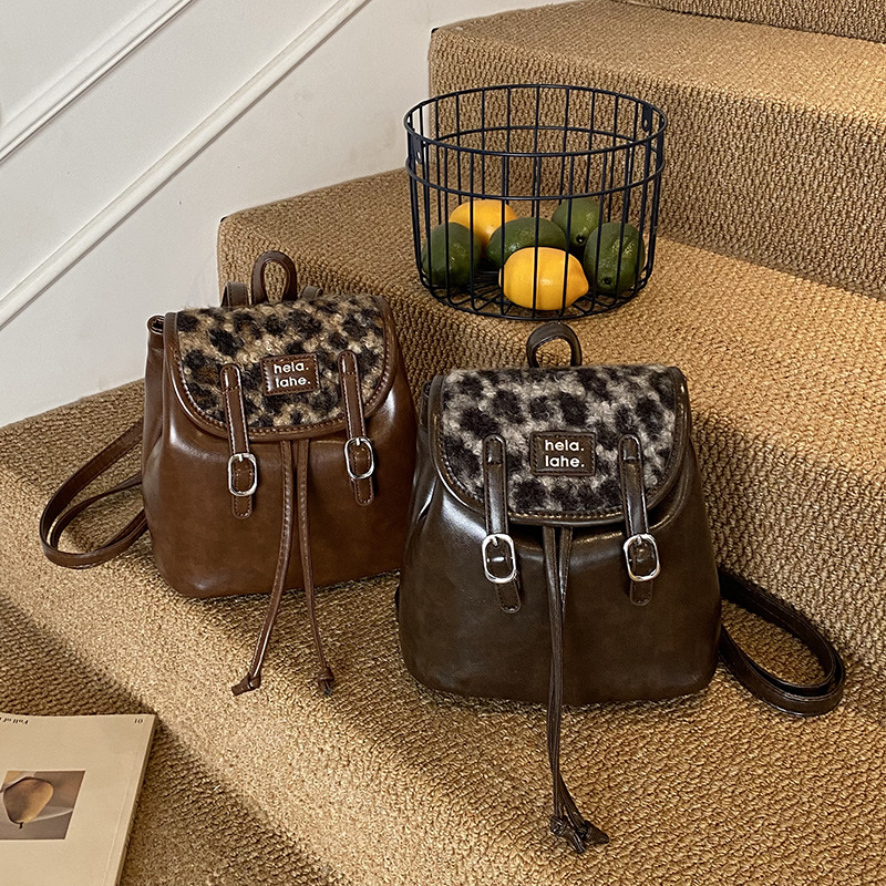 Mochila popular coreana para niños y niñas, mochila de estilo de estilo de la universidad, nueva mochila de invierno y otoño para niños estampados de lana