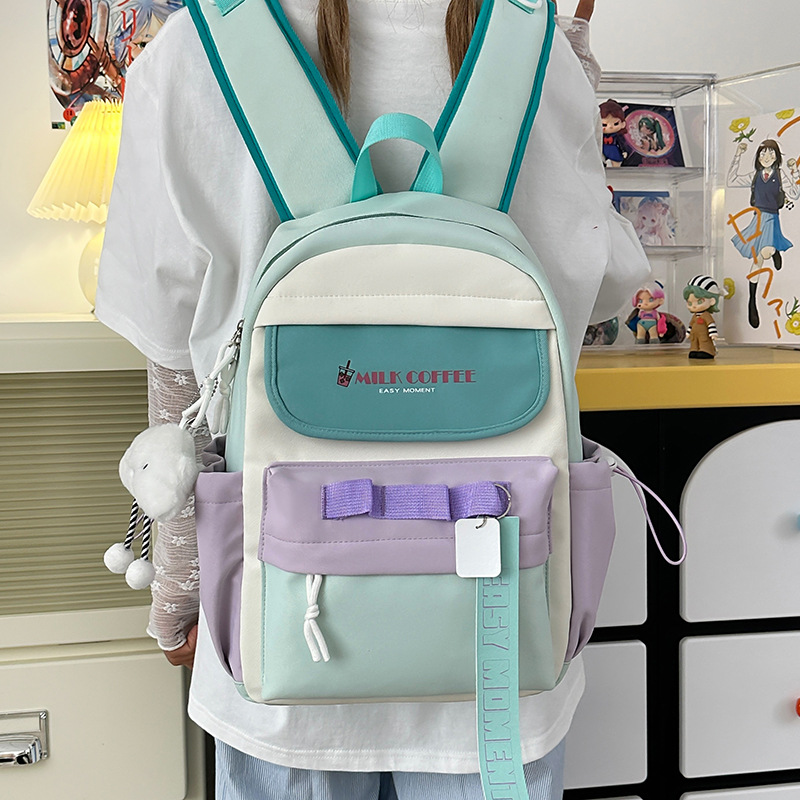 Mochila escolar de estudiante de doble bolsillo con letras de estilo universitario Versión coreana de la mochila de gran capacidad para estudiantes de secundaria y preparatoria al por mayor para niñas de alto valor