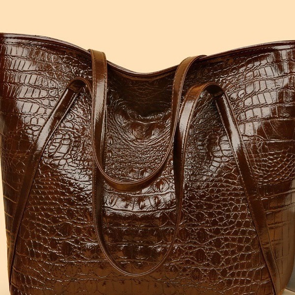 Bolso de mujer de textura nueva transfronteriza, bolso de hombro de gran capacidad, válvula de reparación de almacén de bloqueo de moda de todo fósforo, reducir el fuego y refrescarse