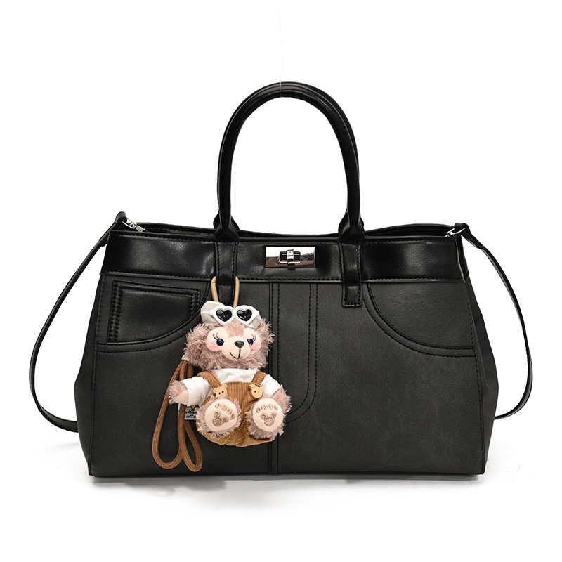 Bolso de mano retro de otoño y invierno para mujeres 2025 nuevo estilo de alta calidad de la bolsa de transporte de viaje empalmado bolso de hombro