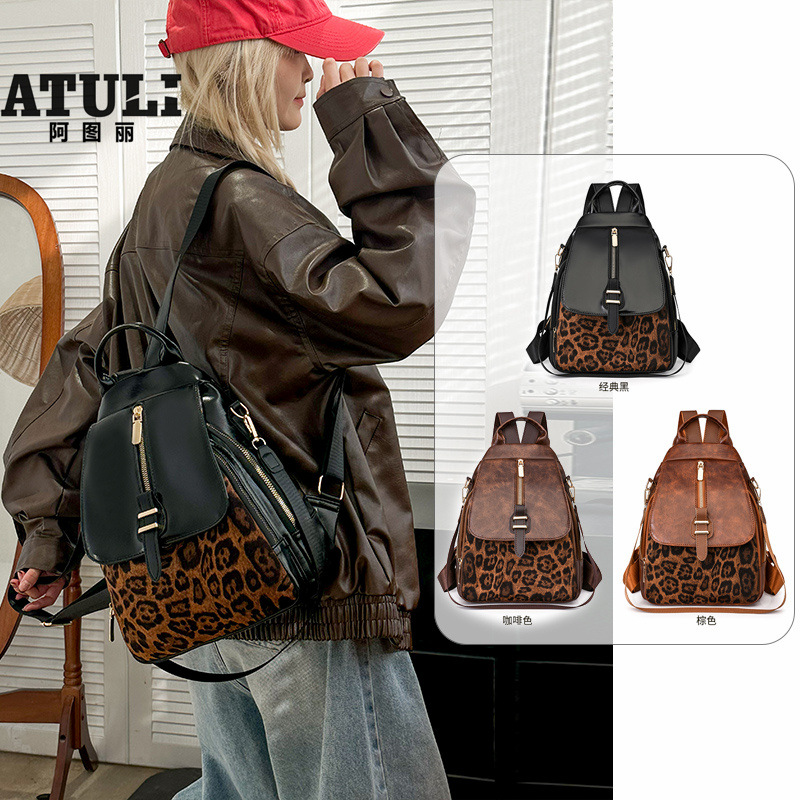 2025 primavera nuevo comercio exterior retro mochila casual impresión de tendencia de contraste de color moda al aire libre versátil gran capacidad