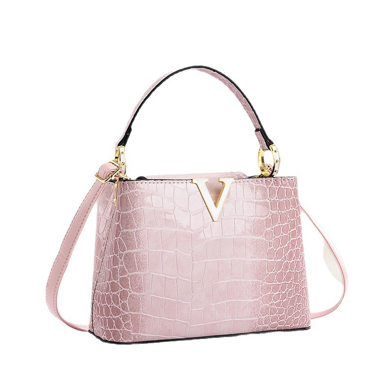 Patrón de cocodrilo de charol 2025 nuevo bolso de moda bolso de cubo de mediana edad bolso de mensajero de hombro para mujer madre degradada