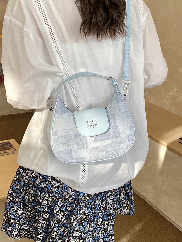 2026 nuevo nicho de diseño bolso de media luna retro bolso de moda universal bolso de mano de mujer casual bajo bolso de hombro