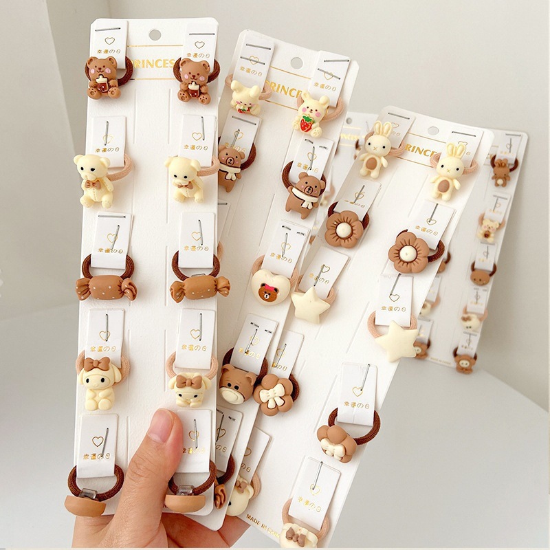 La banda de goma marrón leche simple y Linda para las mujeres no duele la banda del pelo de la cuerda del pelo de la cola de caballo del tamaño pequeño para las mujeres