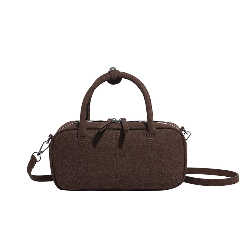 Bolso de bolos de nicho coreano, bolso de bolos retro de alta calidad, bolso de alta calidad.