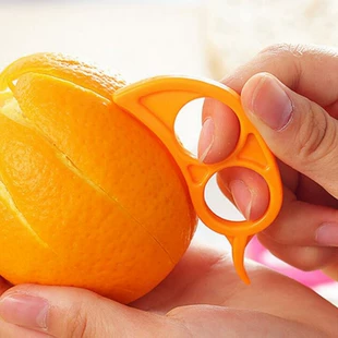 Fruit peeler mouse‑shaped handheld citrus peeler, dual‑blade plastic, compact orange