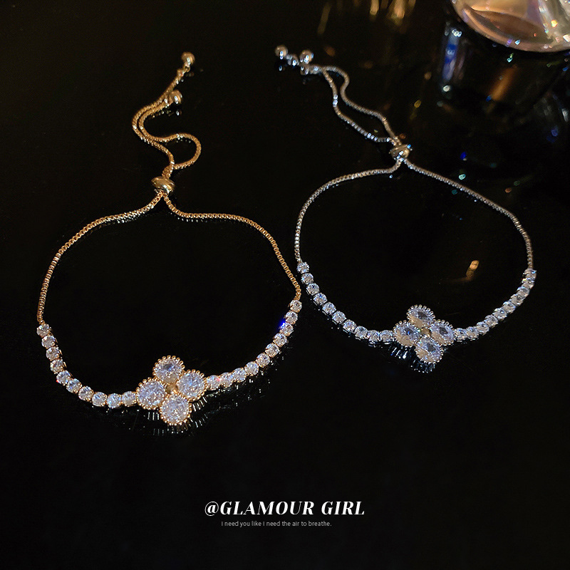 Real oro electrochapado flor ZIRCON pull-out pulsera personalizada pulsera de moda elegante luz de lujo de alta calidad pulsera al por mayor