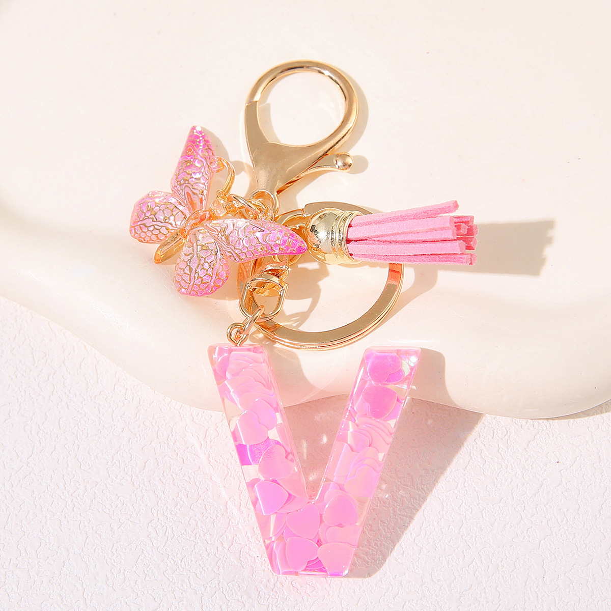 Nuevo rosa damas letras A-Z llavero de goteo de goma sequilla amor letras bordas mariposa llavero transfronterizo