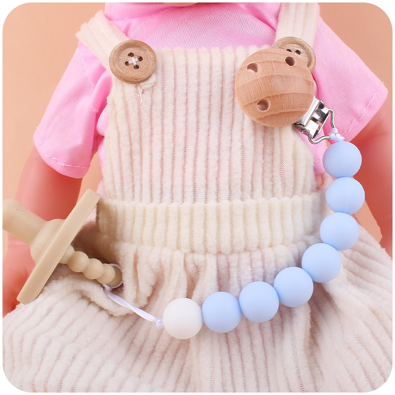 Nuevos suministros para bebés Cadena de chupete clip de haya cadena anti-caída de silicona pegamento de mordedura pezón molar cadena anti-caída